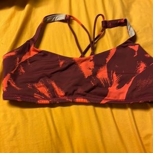 Maroon and orange sports bra